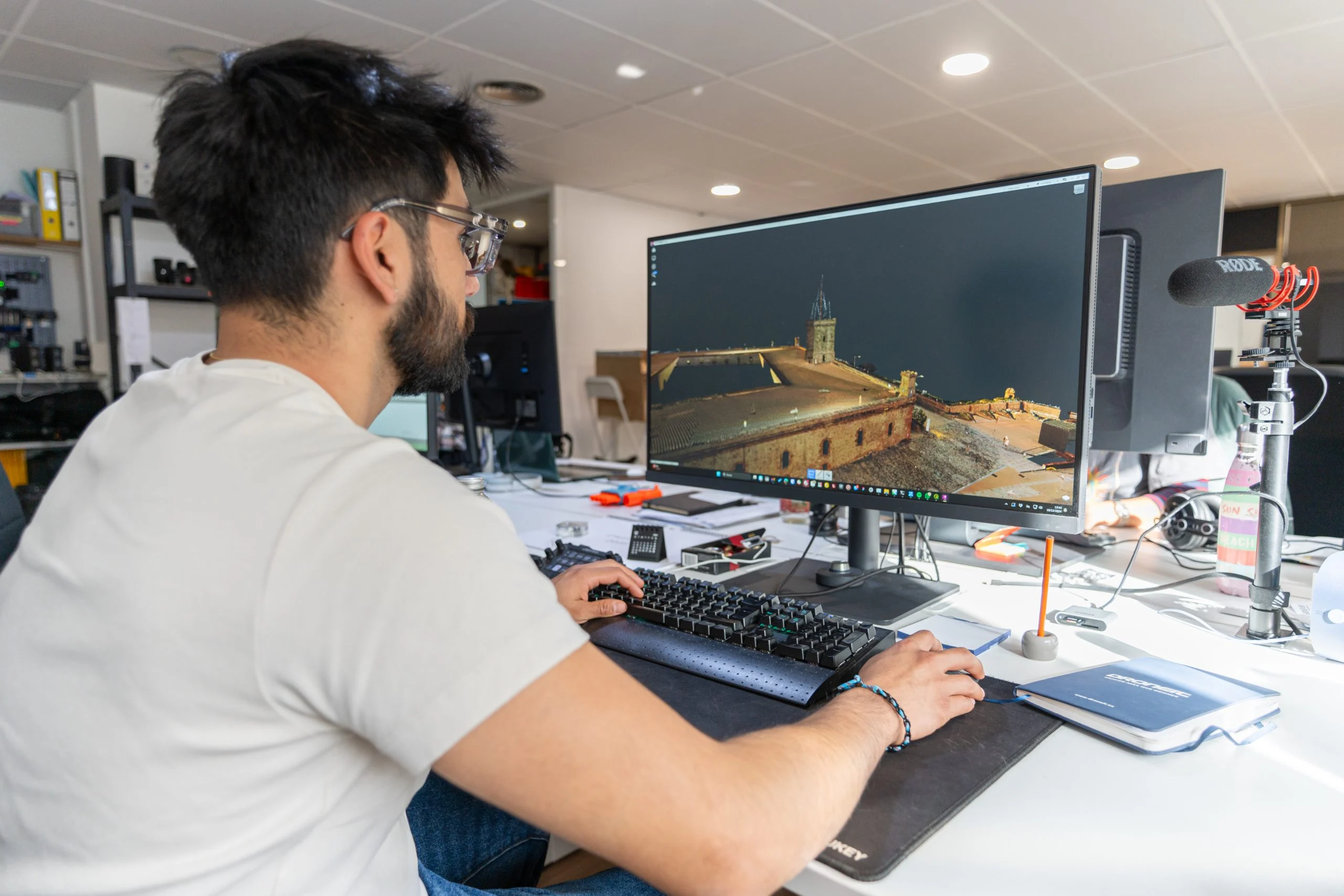 Processing a drone photogrammetry model at the Droneit office