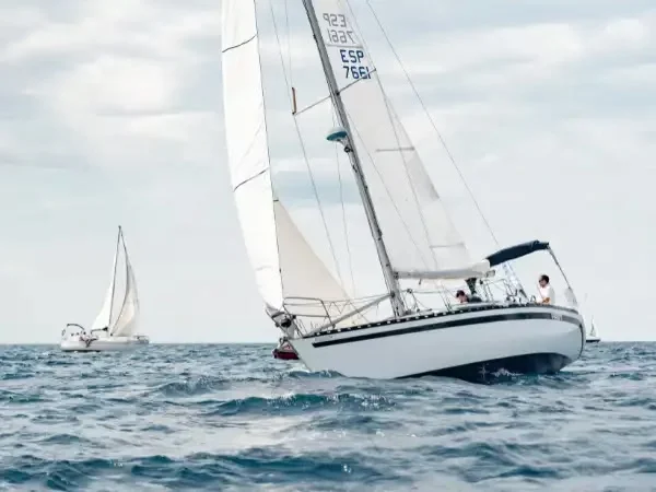 Photograph of a sailing yacht in a regatta