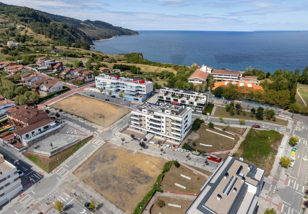 Aerial 360º panorama of a housing development on the coast at Bermeo